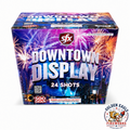 Downtown Display 500 gram aerial cake by SFX Fireworks — 24 shots, bold city skyline fireworks packaging, available at Golden Eagle Fireworks
