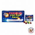 Premium Pop Pop Snap novelty throw snaps featuring assorted red, yellow, and green snaps, compact blue box packaging, ground-snap fun, and party fireworks available at Golden Eagle Fireworks.
